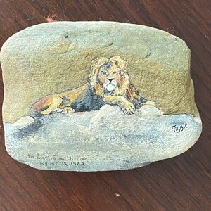 Hand Painted Rock with Lion lounging signed by Tibbie